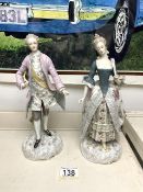 A PAIR OF CONTINENTAL PORCELAIN FIGURES OF LADY AND GENT IN 18TH-CENTURY DRESS, 27 CM.