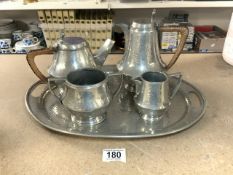 A HAND BEATEN PEWTER TEA AND COFFEE SET ON TRAY.