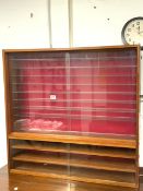 A TEAK CASED GLAZED HANGING COLLECTORS CABINET WITH GLASS AND WOODEN SHELVES, 98X92X15 CMS.
