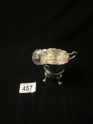 HALLMARKED SILVER HELMET SHAPED CREAM JUG RAISED ON LION MASK SUPPORTS AND PAD FEET DATED 1972 BY