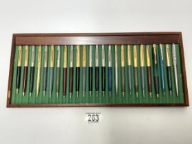 TWENTY-FIVE PARKER VINTAGE BALL POINT PENS AND PROPELLING PENCILS.