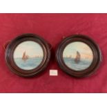 A PAIR OF SMALL CIRCULAR OILS OF SAILING BOATS, SIGNED C HALE, 16 CMS DIAMETER.