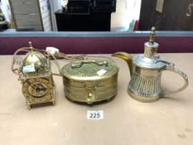 EASTERN BRASS CRICKET CONTAINER, BRASS LANTERN CLOCK WITH ELECTRIC MOVEMENT, AND TURKISH METAL JUG.
