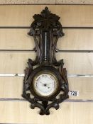 SMALL CARVED BLACK FOREST WALL BAROMETER.