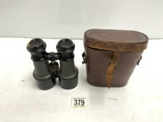A PAIR OF FRENCH MADE MILITARY BINOCULARS IN LEATHER CASE.