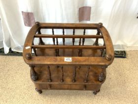 A VICTORIAN WALNUT THREE DIVISION CANTERBURY WITH SINGLE DRAWER AND TURNED SUPPORTS.