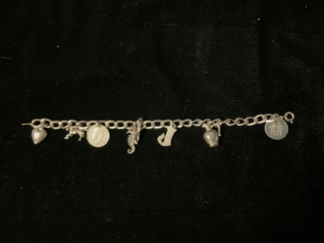 A SILVER CHARM BRACELET AND CHARMS. - Image 2 of 3