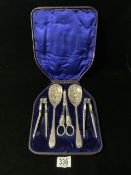 VICTORIAN CASED SILVER-PLATED FIVE-PIECE SERVING SET COMPRISING TWO EMBOSSED SPOONS, GRAPE SHEARS