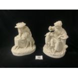 A PAIR OF SAMUEL ALCOCK & SONS PARIANWARE FIGURES OF SEATED LADIES WITH DOG AND SHEEP, BLACK PRINTED