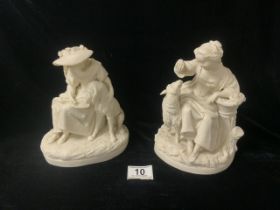 A PAIR OF SAMUEL ALCOCK & SONS PARIANWARE FIGURES OF SEATED LADIES WITH DOG AND SHEEP, BLACK PRINTED
