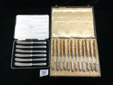 SET OF SIX SILVER HANDLE TEA KNIVES IN CASE, AND SET OF TWELVE PLATED TEA KNIVES IN CASE.