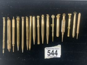 SMALL TRAY OF GOLD-PLATED PROPELLING PENCILS AND HOLDERS.