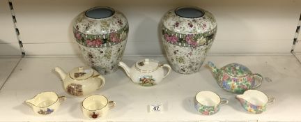 TWO ROYAL WINTON PART TEA SETS AND A PAIR OF CHINTZ PATTERN VASES, 21 CMS.