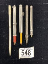 FIVE SAMPSON MORDAN SILVER AND WHITE METAL PROPELLING PENCILS AND HOLDERS