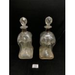 A PAIR OF SILVER COLLARED DIMPLE GLASS DECANTERS;ONE A/F