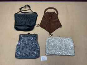 FOUR VINTAGE BEADED EVENING BAGS.