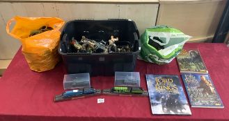 A QUANTITY OF TOY ACTION FIGURES VARIOUS - INCLUDES LORD OF THE RINGS, MODEL TRAINS AND MORE.