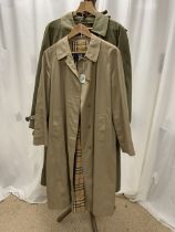A BURBERRY OVERCOAT AND ANOTHER SIMILAR.