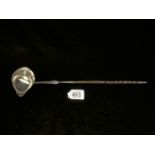A GEORGE III HALLMARKED SILVER PUNCH LADLE WITH REEDED EDGE OVAL BOWL AND TWISTED WHALE BONE HANDLE;