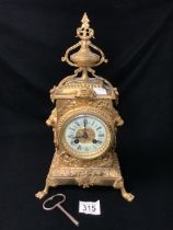 ANTIQUE FRENCH BAROQUE CLOCK 'LIONS MASKS' CIRCA 1900 IN GILT BRONZE WITH PENDULUM AND KEY, 37CM