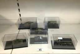 FOUR MODEL TANKS IN CASES AND TWO MODEL TROUP CARRIERS.
