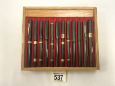 FIVE ANTIQUE FOUNTAIN PENS BY MABIE TODD, AND OTHERS, TWO WITH HALLMARKED GOLD BANDS.