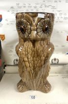 A CERAMIC OWL STICK STAND, 44 CMS.