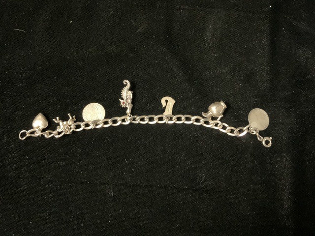 A SILVER CHARM BRACELET AND CHARMS. - Image 3 of 3