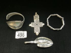 FOUR PIECES OF WHITE METAL INCLUDES BANGLES