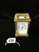 BRASS CARRIAGE CLOCK WITH WHITE ENAMEL DIAL,WORKING ORDER WITH KEY 12CM