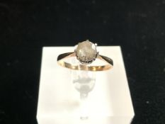 A 9CT GOLD PASTE SET SOLITAIRE RING, 1.8 GMS.