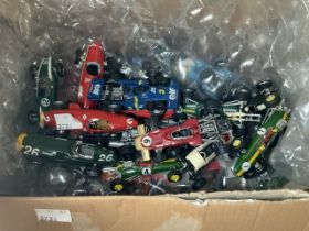 A COLLECTION OF MODEL RACING CARS BY RCA COLLECTIBLES.