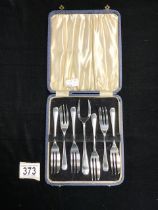 A CASED SET OF SIX HALLMARKED SILVER PASTRY FORKS AND MATCHING SERVING FORK, SHEFFIELD 1937, EMILE