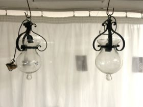 PAIR OF GLASS AND WROUGHT IRON CEILING LIGHTS