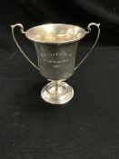 A HALLMARKED SILVER TWO HANDLED TROPHY CUP, BIRMINGHAM 1935 - WILLIAM ADAMS LTD, 13 CMS, 128 GMS.
