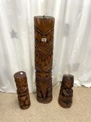 THREE CARVED WOODEN TOTEM POLES LARGEST 97CM