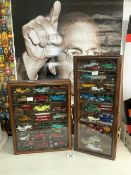 COLLECTION OF MODELS OF VINTAGE CARS AND TRANSPORT VEHICLES IN DISPLAY CABINETS.