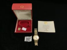 OMEGA 9CT GOLD-CASED AUTOMATIC WRISTWATCH WITH BOX AND BOOKLET (STRAP GOLD-PLATED)