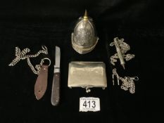 A POLICEMANS HAT NOVELTY TABLE LIGHTER, PLATED CIGARETTE CASE, CHAINS AND PROPELLING PENCIL.