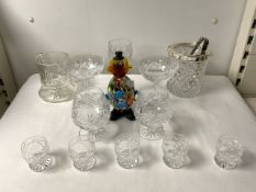 A MURANO COLOURED GLASS CLOWN, TWO CUT CRYSTAL GLASS SHIPS DECANTERS AND OTHER CUT GLASSWARE.