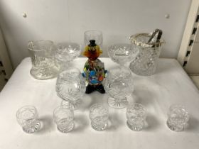 A MURANO COLOURED GLASS CLOWN, TWO CUT CRYSTAL GLASS SHIPS DECANTERS AND OTHER CUT GLASSWARE.