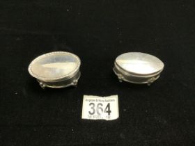 TWO SMALL HALLMARKED SILVER OVAL RING BOXES, 1 WITH BEADED EDGE, 1905 & 1916, 6CMS LARGEST.