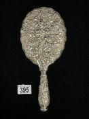 TIFFANY STERLING SILVER HAND MIRROR WITH EMBOSSED FLORAL AND ORGANIC DECORATION, 32 CMS.