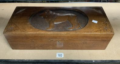 LARGE OAK WRITING SLOPE WITH A CARVED LION TO TOP 56 X 23CM