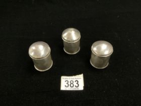 A SET OF THREE STERLING SILVER CYLINDRICAL CONDIMENTS.