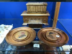 THREE WOODEN BOXES WITH TWO ROUND PLAQUES