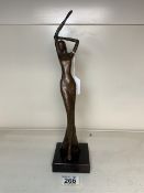 A BRONZE SCULPTURE OF A LADY WITH A MONOGRAM SIGNATURE, 37 CMS.