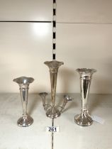 THREE HALLMARKED SILVER TRUMPET SHAPE POSY VASES, 20 CMS TALLEST.