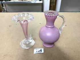 PINK GLASS TRUMPET VASE; 14CM WITH A PINK JUG; 15CM