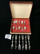 SIX WHITE METAL DUTCH PICKLE FORKS AND FIVE 800 SILVER COFFEE SPOONS.